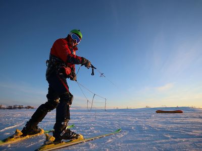 Man holding a plank position viewed from a low angle.